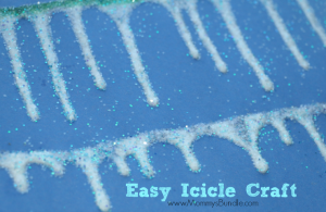This easy icicle å is perfect for teaching toddlers about winter. Just grab some glitter and glue to make this winter art piece.