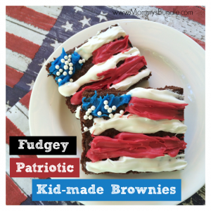 Patriotic flag-shaped brownies decorated by toddlers. A fun 4th of July dessert recipe for kids to help with!